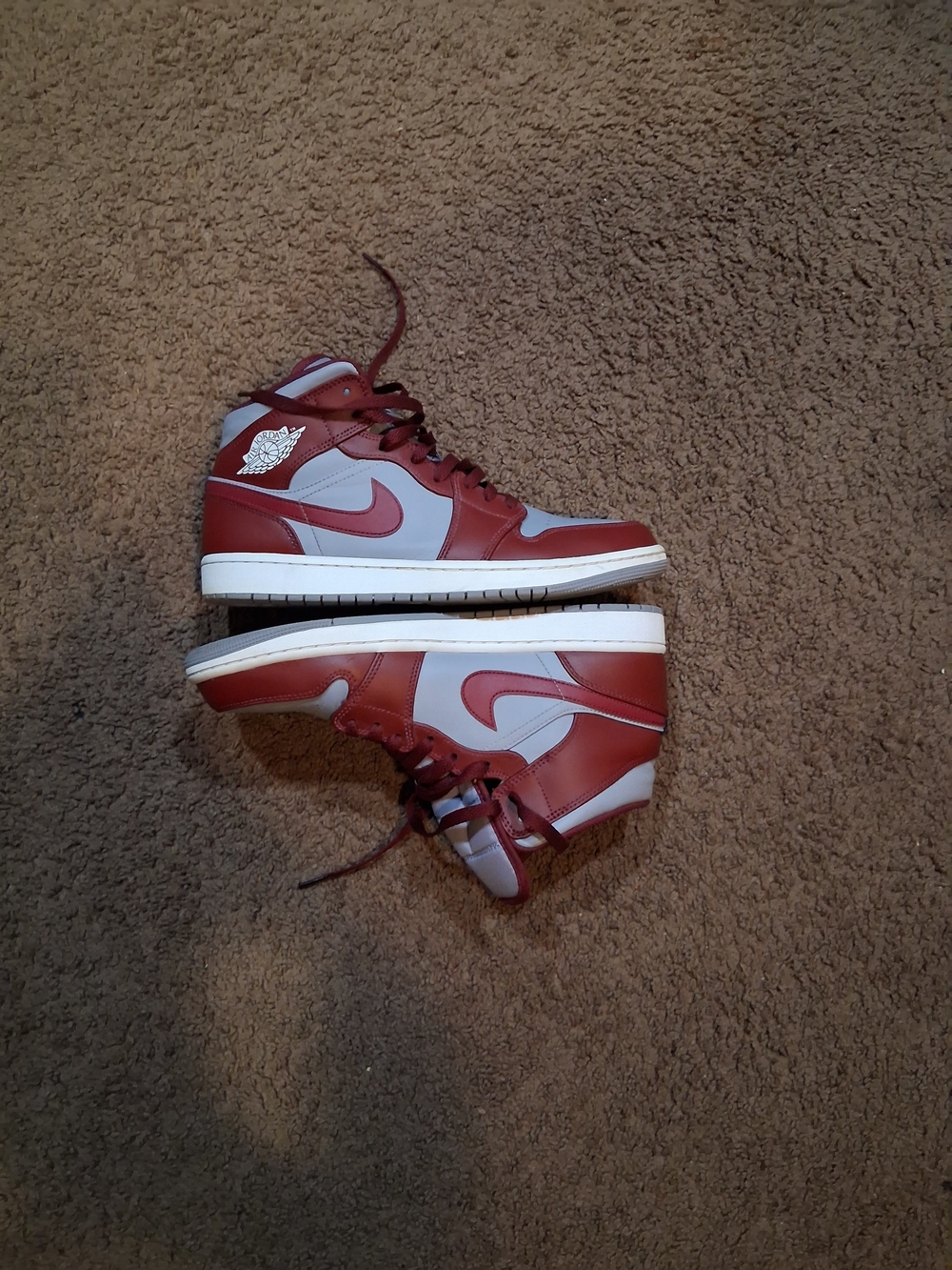 Nike Men’s Red and White Air Jordan 1 Mid Athletic Shoes